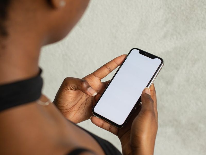 Smartphone displaying booking app with user-friendly interface design