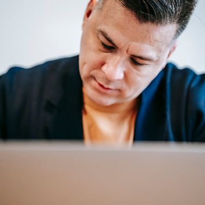 Tech professional man with short hair in smart casual clothing